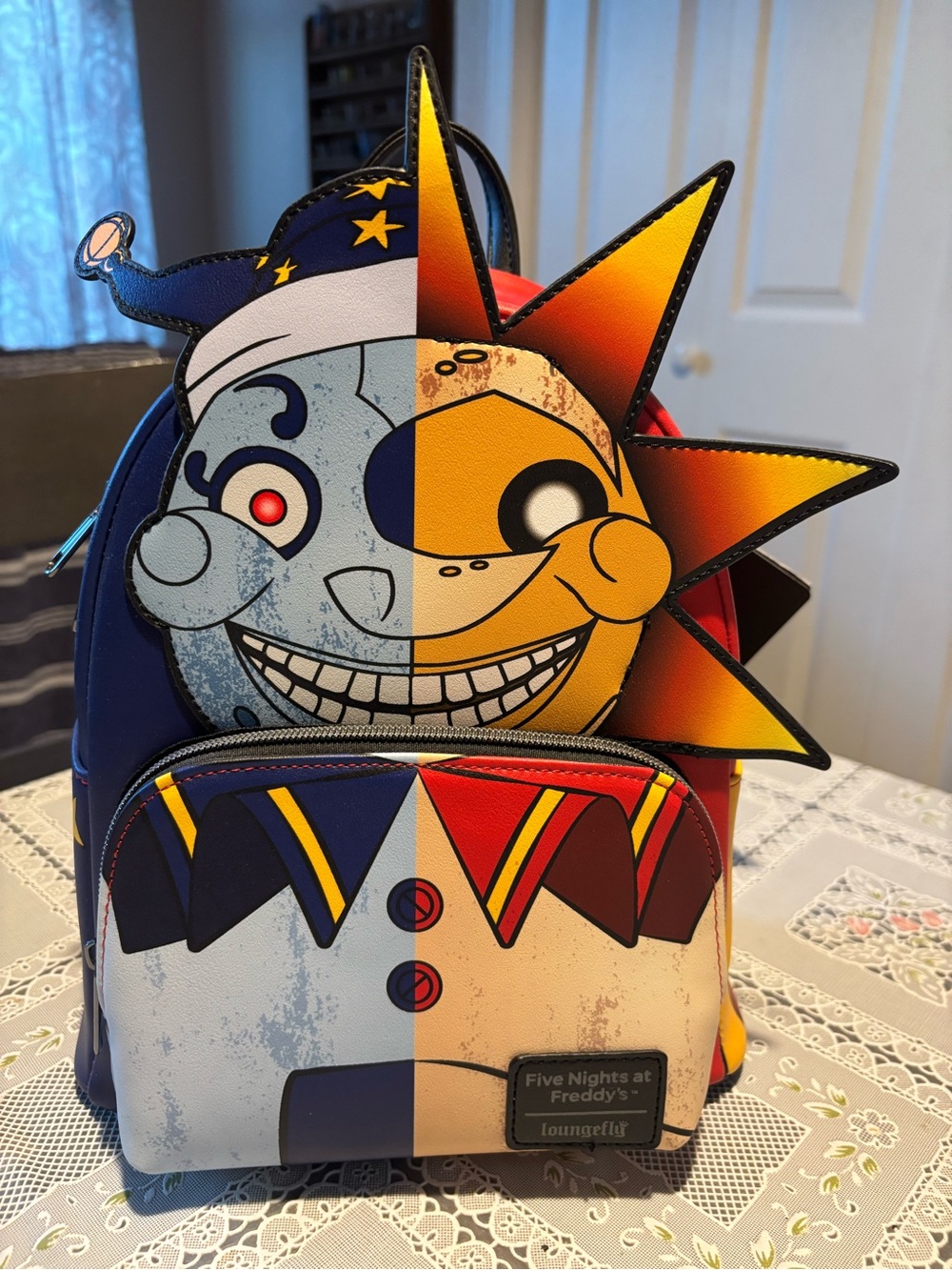 Loungefly Five Nights at Freddy's Sun & Moon Mini Backpack - Blue, Yellow, Red